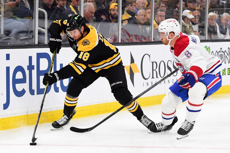 Oct 10, 2024; Boston, Massachusetts, USA; Boston Bruins center Pavel Zacha (18) controls the puck from Montreal Canadiens defenseman Mike Matheson (8) during the first period at TD Garden. Mandatory Credit: Bob DeChiara-Imagn Images