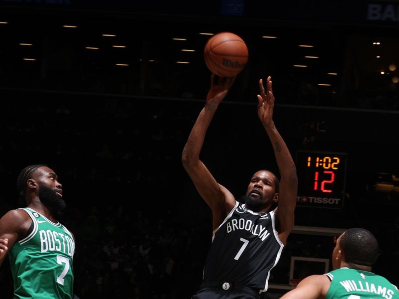 BROOKLYN, NY - DECEMBER 4: Kevin Durant #7 of the Brooklyn Nets shoots the ball during the game against the Boston Celtics on December 4, 2022 at Barclays Center in Brooklyn, New York. NOTE TO USER: User expressly acknowledges and agrees that, by downloading and or using this Photograph, user is consenting to the terms and conditions of the Getty Images License Agreement. Mandatory Copyright Notice: Copyright 2022 NBAE (Photo by Nathaniel S. Butler/NBAE via Getty Images)