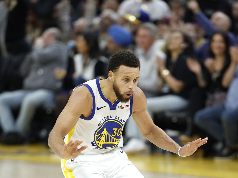 SAN FRANCISCO, CALIFORNIA - JANUARY 02: Stephen Curry #30 of the Golden State Warriors reacts after making a shot against the Orlando Magic during the second quarter of an NBA basketball game at Chase Center on January 02, 2024 in San Francisco, California. NOTE TO USER: User expressly acknowledges and agrees that, by downloading and or using this photograph, User is consenting to the terms and conditions of the Getty Images License Agreement. (Photo by Thearon W. Henderson/Getty Images)