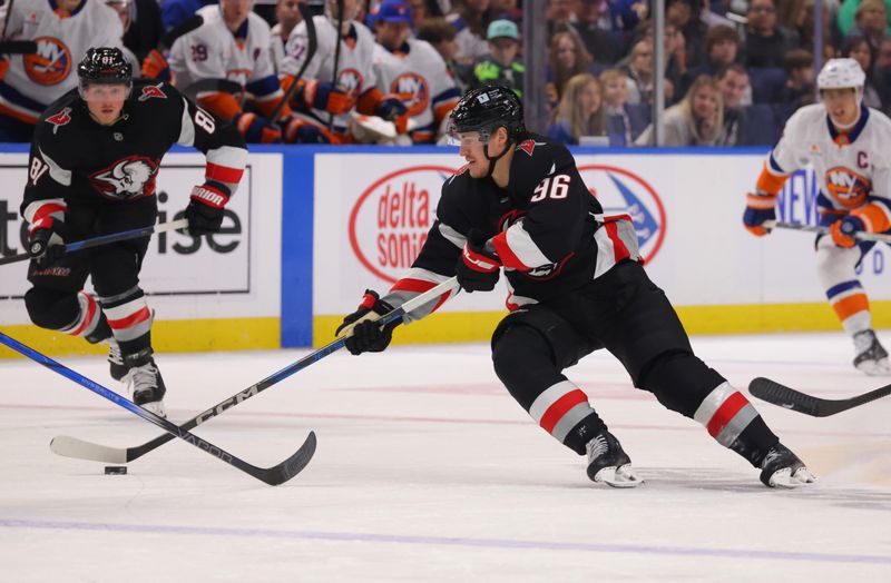 Nov 1, 2024; Buffalo, New York, USA;  Buffalo Sabres right wing Nicolas Aube-Kubel (96) skates with the puck during the second period against the New York Islanders at KeyBank Center. Mandatory Credit: Timothy T. Ludwig-Imagn Images