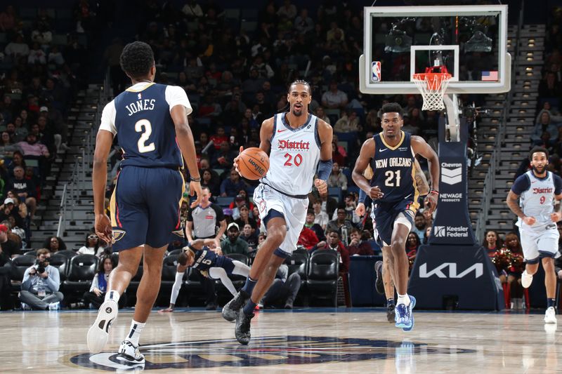 NEW ORLEANS, LA - JANUARY 3:  Alexandre Sarr #20 of the Washington Wizards handles the ball during the game against the New Orleans Pelicans on January 3, 2025 at the Smoothie King Center in New Orleans, Louisiana. NOTE TO USER: User expressly acknowledges and agrees that, by downloading and or using this Photograph, user is consenting to the terms and conditions of the Getty Images License Agreement. Mandatory Copyright Notice: Copyright 2025 NBAE (Photo by Layne Murdoch Jr./NBAE via Getty Images)