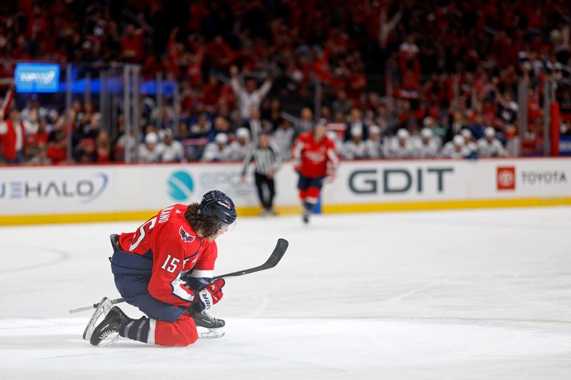 Apr 13, 2024; Washington, District of Columbia, USA; Washington Capitals left wing Sonny Milano (15) celebrates after scoring a goal against the Tampa Bay Lightning in the first period at Capital One Arena. Mandatory Credit: Geoff Burke-USA TODAY Sports