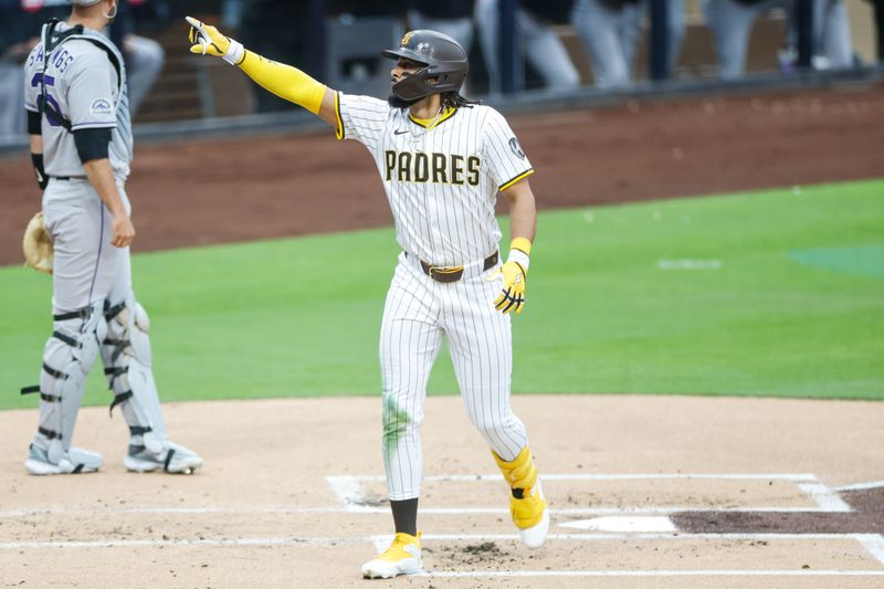 Apr 12, 2025; San Diego, California, USA; San Diego Padres right fielder Fernando Tatis Jr. (23) celebrates with the fans after hitting a one-run home run during the first inning against the Colorado Rockies at Petco Park. Mandatory Credit: David Frerker-Imagn Images