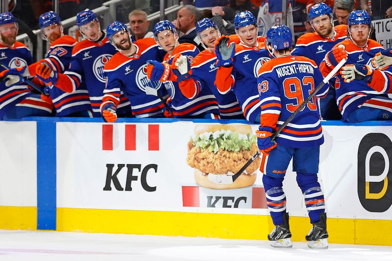 Jan 25, 2025; Edmonton, Alberta, CAN;  The Edmonton Oilers celebrate a goal scored by forward Ryan Nugent-Hopkins (93) during the third period against the Buffalo Sabres at Rogers Place. Mandatory Credit: Perry Nelson-Imagn Images