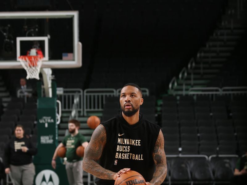 MILWAUKEE, WI - FEBRUARY 9: Damian Lillard #0 of the Milwaukee Bucks warms up before the game against the Charlotte Hornets on February 9, 2024 at the Fiserv Forum Center in Milwaukee, Wisconsin. NOTE TO USER: User expressly acknowledges and agrees that, by downloading and or using this Photograph, user is consenting to the terms and conditions of the Getty Images License Agreement. Mandatory Copyright Notice: Copyright 2024 NBAE (Photo by Gary Dineen/NBAE via Getty Images).