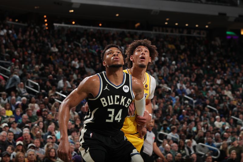 MILWAUKEE, WI - MARCH 26: Giannis Antetokounmpo #34 of the Milwaukee Bucks and Jaxson Hayes #11 of the Los Angeles Lakers battle for position during the game on March 26, 2024 at the Fiserv Forum Center in Milwaukee, Wisconsin. NOTE TO USER: User expressly acknowledges and agrees that, by downloading and or using this Photograph, user is consenting to the terms and conditions of the Getty Images License Agreement. Mandatory Copyright Notice: Copyright 2024 NBAE (Photo by Gary Dineen/NBAE via Getty Images).