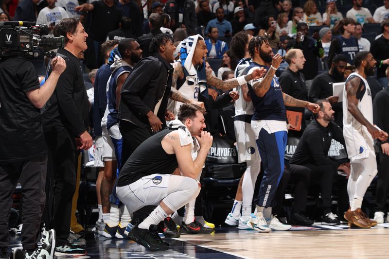 MINNEAPOLIS, MN - MAY 30: Luka Doncic #77 of the Dallas Mavericks smiles during the game against the Minnesota Timberwolves during Round 3 Game 5 of the 2024 NBA Playoffs on May 30, 2024 at Target Center in Minneapolis, Minnesota. NOTE TO USER: User expressly acknowledges and agrees that, by downloading and or using this Photograph, user is consenting to the terms and conditions of the Getty Images License Agreement. Mandatory Copyright Notice: Copyright 2024 NBAE (Photo by Joe Murphy/NBAE via Getty Images)