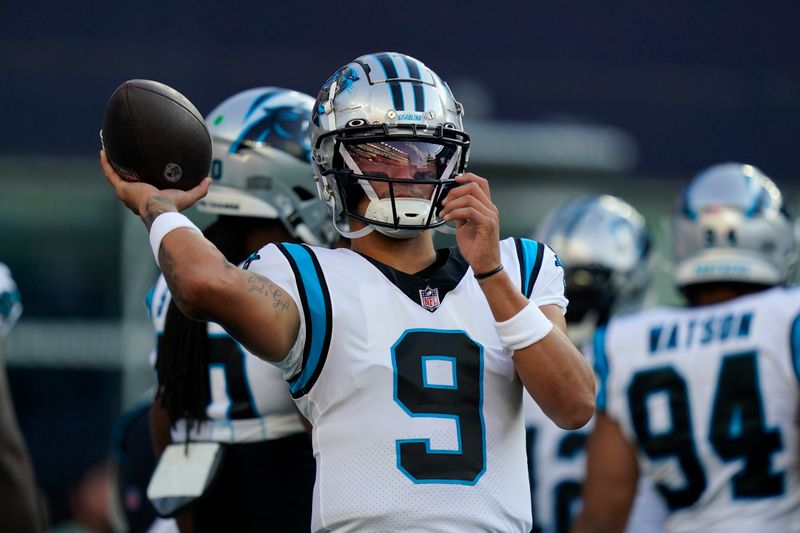 Carolina Panthers quarterback Matt Corral (9) prior to a preseason NFL football game against the New England Patriots, Friday, Aug. 19, 2022, in Foxborough, Mass. (AP Photo/Charles Krupa)