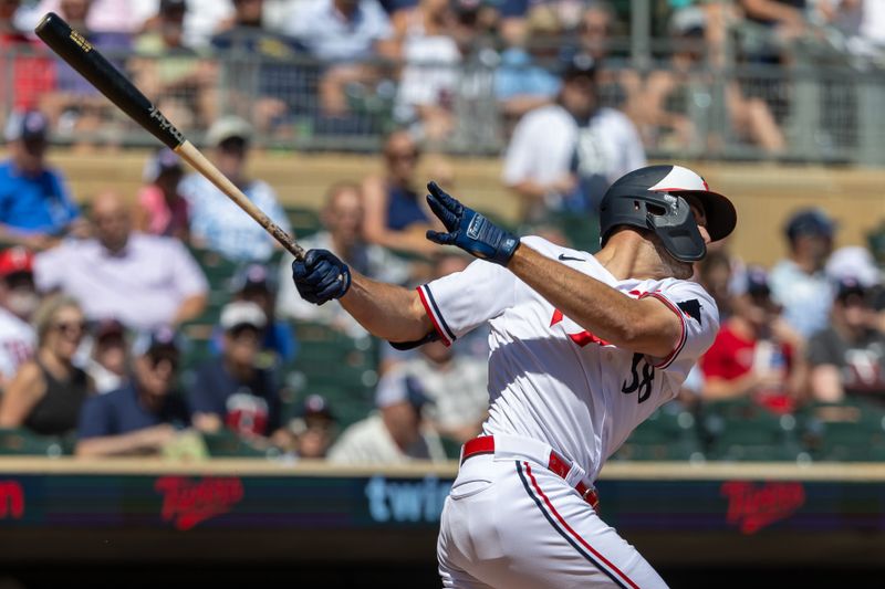 Aug 16, 2023; Minneapolis, Minnesota, USA; Minnesota Twins left fielder Matt Wallner (38) hits a single against the Detroit Tigers in the third inning at Target Field. Mandatory Credit: Jesse Johnson-USA TODAY Sports