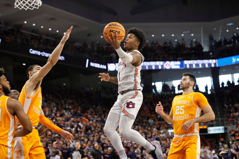 Mar 4, 2023; Auburn, Alabama, USA; Auburn Tigers guard Wendell Green Jr. (1) shoots the ball against the Tennessee Volunteers during the second half at Neville Arena. Mandatory Credit: John Reed-USA TODAY Sports