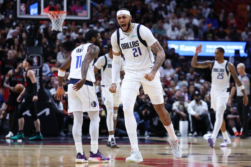 MIAMI, FLORIDA - APRIL 10: Daniel Gafford #21 of the Dallas Mavericks reacts during the fourth quarter against the Miami Heat at Kaseya Center on April 10, 2024 in Miami, Florida. NOTE TO USER: User expressly acknowledges and agrees that, by downloading and or using this photograph, User is consenting to the terms and conditions of the Getty Images License Agreement. (Photo by Megan Briggs/Getty Images)