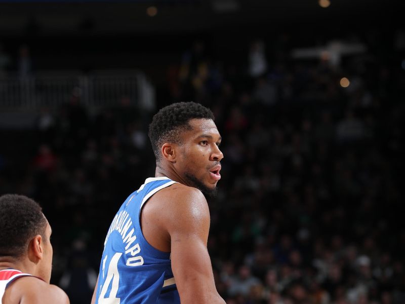 MILWAUKEE, WI - NOVEMBER 30: Giannis Antetokounmpo #34 of the Milwaukee Bucks handles the ball during the game against the Washington Wizards on November 30, 2024 at Fiserv Forum Center in Milwaukee, Wisconsin. NOTE TO USER: User expressly acknowledges and agrees that, by downloading and or using this Photograph, user is consenting to the terms and conditions of the Getty Images License Agreement. Mandatory Copyright Notice: Copyright 2024 NBAE (Photo by Gary Dineen/NBAE via Getty Images).