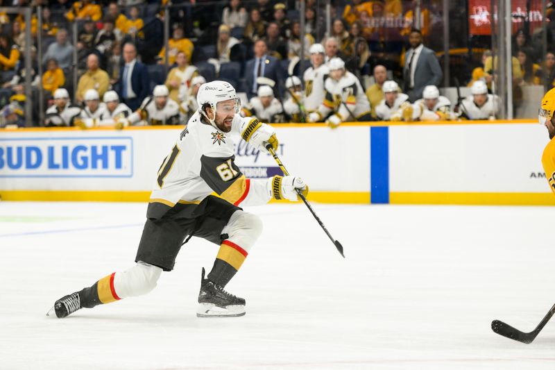 Jan 14, 2025; Nashville, Tennessee, USA;  Vegas Golden Knights right wing Mark Stone (61) takes a shot on goal against the Nashville Predators during the second period at Bridgestone Arena. Mandatory Credit: Steve Roberts-Imagn Images