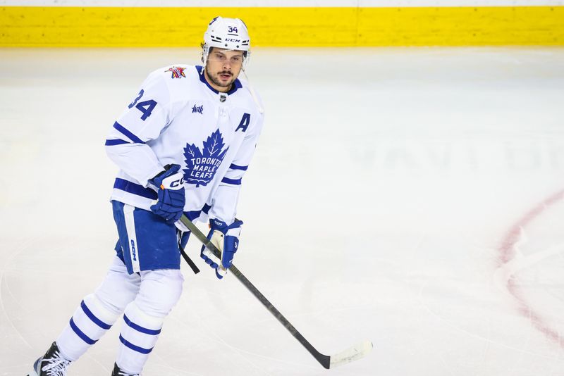 Jan 18, 2024; Calgary, Alberta, CAN; Toronto Maple Leafs center Auston Matthews (34) skates during the warmup period against the Calgary Flames at Scotiabank Saddledome. Mandatory Credit: Sergei Belski-USA TODAY Sports