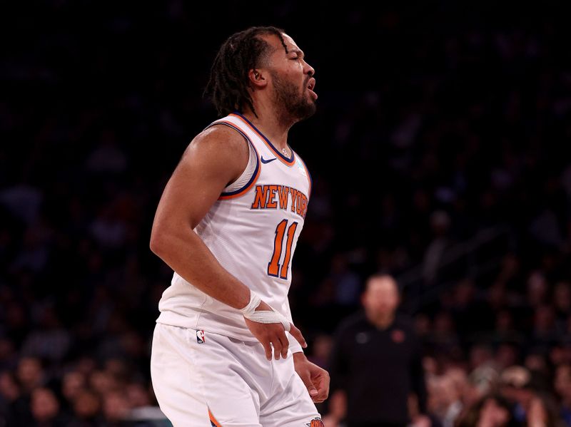 NEW YORK, NEW YORK - JANUARY 18:  Jalen Brunson #11 of the New York Knicks reacts to a missed shot in the first half against the Washington Wizards at Madison Square Garden on January 18, 2024 in New York City. NOTE TO USER: User expressly acknowledges and agrees that, by downloading and or using this photograph, User is consenting to the terms and conditions of the Getty Images License Agreement (Photo by Elsa/Getty Images)