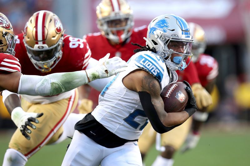 Detroit Lions running back Jahmyr Gibbs (26) runs during the NFC Championship NFL football game against the San Francisco 49ers in Santa Clara, Calif., Sunday, Jan. 28, 2024. (AP Photo/Scot Tucker)