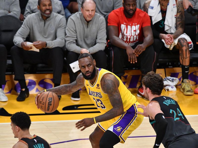 LOS ANGELES, CA - FEBRUARY 29:  LeBron James #23 of the Los Angeles Lakers goes to the basket during the game on February 29, 2024 at Crypto.Com Arena in Los Angeles, California. NOTE TO USER: User expressly acknowledges and agrees that, by downloading and/or using this Photograph, user is consenting to the terms and conditions of the Getty Images License Agreement. Mandatory Copyright Notice: Copyright 2024 NBAE (Photo by Juan Ocampo/NBAE via Getty Images)