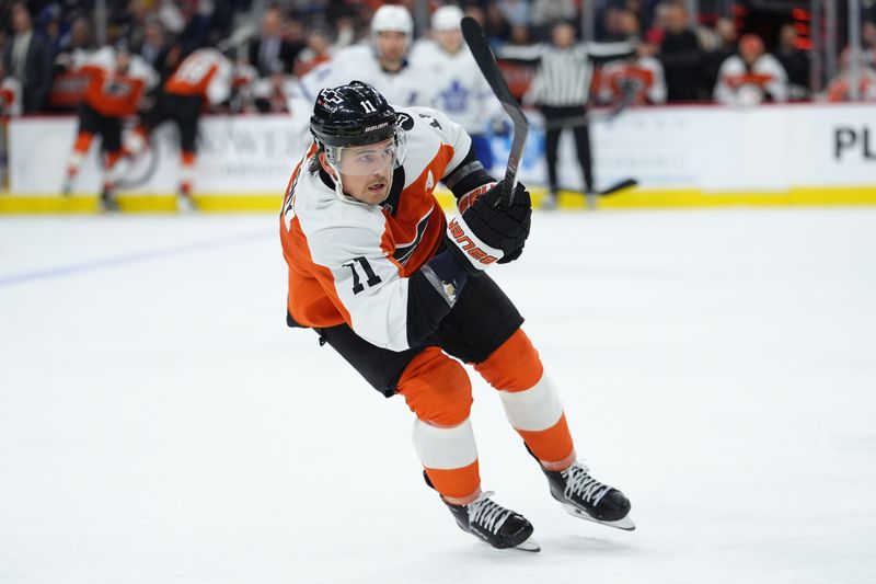 Nov 1, 2025; Philadelphia, Pennsylvania, USA; Philadelphia Flyers right wing Travis Konecny (11) in action against the Toronto Maple Leafs in the second period at Xfinity Mobile Arena. Mandatory Credit: Kyle Ross-Imagn Images