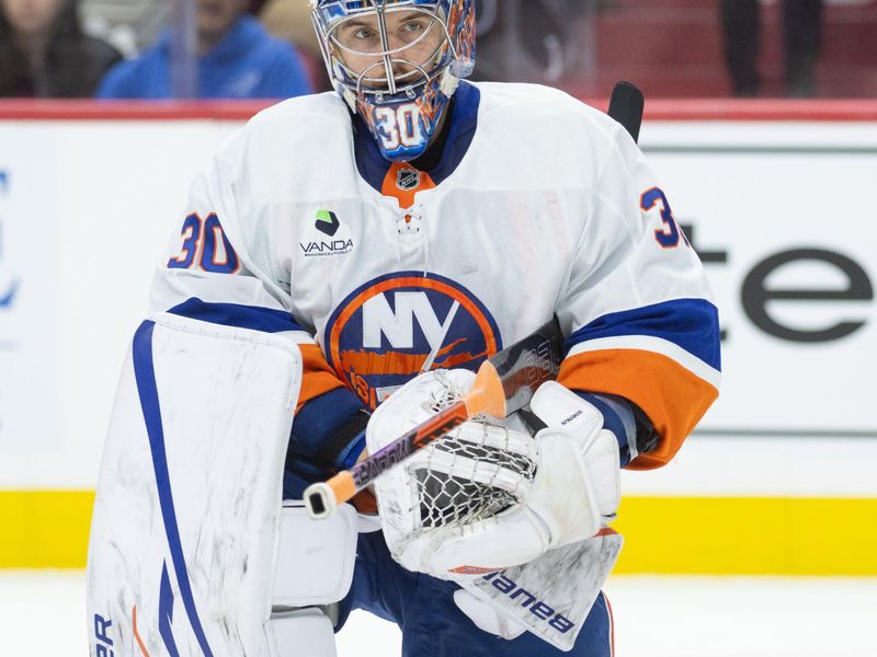 Oct 18, 2025; Ottawa, Ontario, CAN; New York Islanders goalie Ilya Sorokin (30) stretches in the first period against the Ottawa Senators at the Canadian Tire Centre. Mandatory Credit: Marc DesRosiers-IMAGN Images
