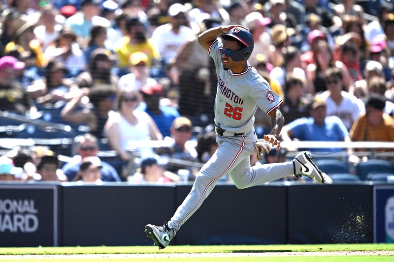 Jun 26, 2024; San Diego, California, USA; Washington Nationals shortstop Nasim Nunez (26) advances home to score a run during the ninth inning against the San Diego Padres at Petco Park. Mandatory Credit: Orlando Ramirez-USA TODAY Sports