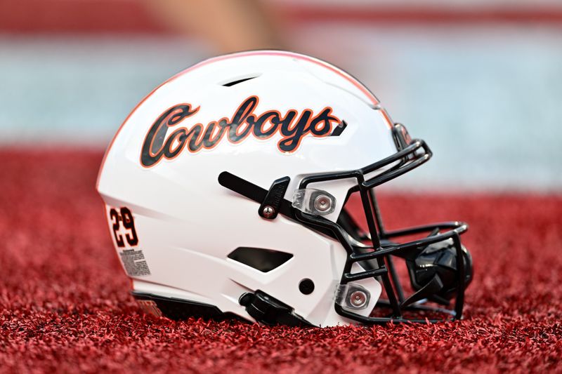 Nov 18, 2023; Houston, Texas, USA; A detailed view of an Oklahoma State Cowboys helmet on the sideline of the game against the Houston Cougars at TDECU Stadium. Mandatory Credit: Maria Lysaker-USA TODAY Sports