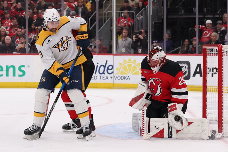 Jan 29, 2026; Newark, New Jersey, USA; New Jersey Devils goaltender Jacob Markstrom (25) makes a save against the Nashville Predators during the third period at Prudential Center. Mandatory Credit: Ed Mulholland-Imagn Images