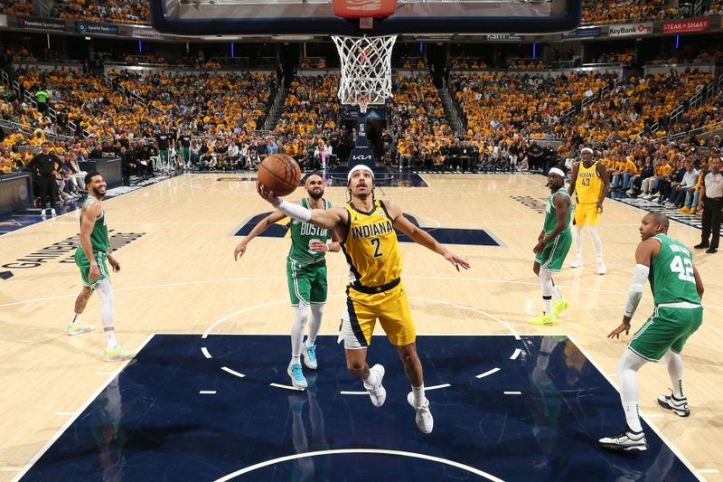 INDIANAPOLIS, IN - MAY 27: Andrew Nembhard #2 of the Indiana Pacers drives to the basket during the game against the Boston Celtics during Game 4 of the Eastern Conference Finals of the 2024 NBA Playoffs on May 27, 2024 at Gainbridge Fieldhouse in Indianapolis, Indiana. NOTE TO USER: User expressly acknowledges and agrees that, by downloading and or using this Photograph, user is consenting to the terms and conditions of the Getty Images License Agreement. Mandatory Copyright Notice: Copyright 2024 NBAE (Photo by Nathaniel S. Butler/NBAE via Getty Images)