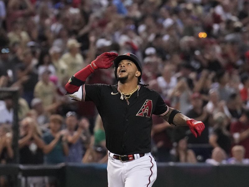 Aug 26, 2023; Phoenix, Arizona, USA; Arizona Diamondbacks second baseman Ketel Marte (4) runs the bases after hitting a three run home run against the Cincinnati Reds during the fifth inning at Chase Field. Mandatory Credit: Joe Camporeale-USA TODAY Sports