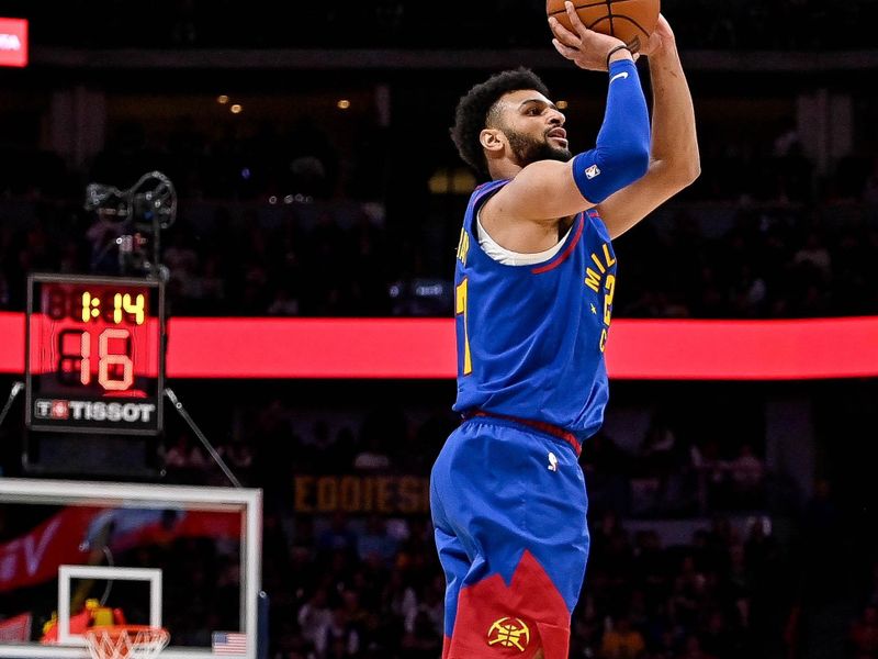 DENVER, CO - MARCH 25:  Jamal Murray #27 of the Denver Nuggets dribbles against the Milwaukee Bucks a game at Ball Arena on March 25, 2023 in Denver, Colorado. NOTE TO USER: User expressly acknowledges and agrees that, by downloading and or using this photograph, User is consenting to the terms and conditions of the Getty Images License Agreement. (Photo by Dustin Bradford/Getty Images)