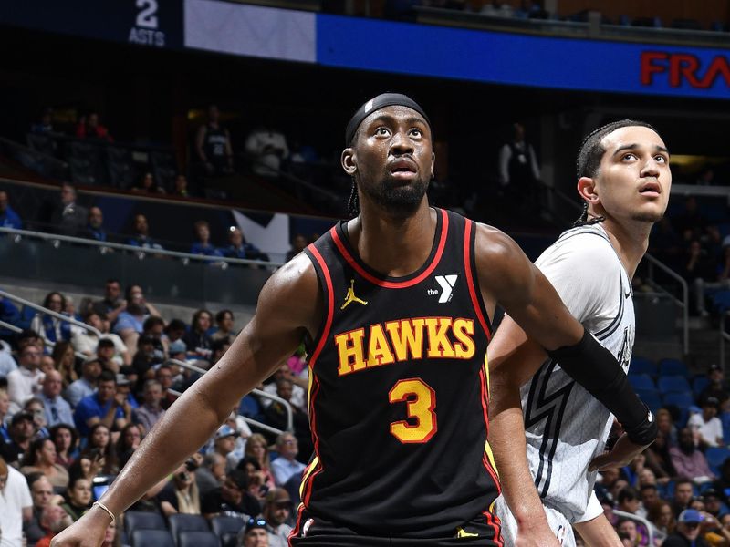 ORLANDO, FL - FEBRUARY 10: Caris LeVert #3 of the Atlanta Hawks boxes out during the game against the Orlando Magic on February 10, 2025 at Kia Center in Orlando, Florida. NOTE TO USER: User expressly acknowledges and agrees that, by downloading and or using this photograph, User is consenting to the terms and conditions of the Getty Images License Agreement. Mandatory Copyright Notice: Copyright 2025 NBAE (Photo by Fernando Medina/NBAE via Getty Images)