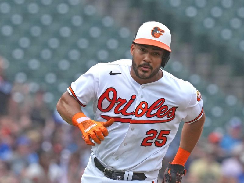 Jul 19, 2023; Baltimore, Maryland, USA; Baltimore Orioles outfielder Anthony Santander (25) rounds third base to score in the second inning against the Los Angeles Dodgers at Oriole Park at Camden Yards. Mandatory Credit: Mitch Stringer-USA TODAY Sports