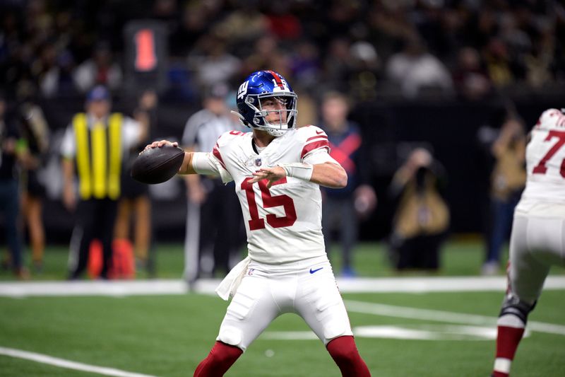 New York Giants quarterback Tommy DeVito throws during the first half of an NFL football game against the New Orleans Saints Sunday, Dec. 17, 2023, in New Orleans. (AP Photo/Matthew Hinton)