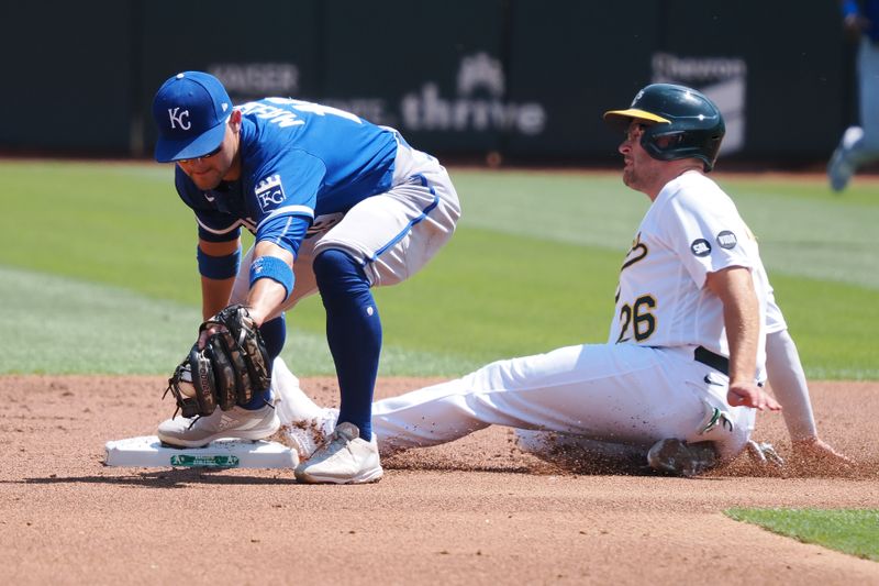 Aug 23, 2023; Oakland, California, USA; Kansas City Royals second baseman Michael Massey (19) catches the ball to make an out against Oakland Athletics designated hitter Jonah Bride (26) during the first inning at Oakland-Alameda County Coliseum. Mandatory Credit: Kelley L Cox-USA TODAY Sports