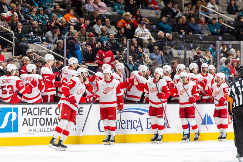 Nov 18, 2024; San Jose, California, USA; Detroit Red Wings celebrate their goal during the second period against the San Jose Sharks at SAP Center at San Jose. Mandatory Credit: Bob Kupbens-Imagn Images