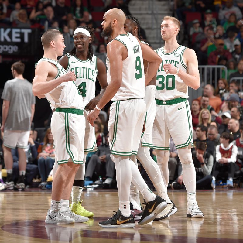 CLEVELAND, OH - MARCH 5: The Boston Celtics huddle up during the game against the Cleveland Cavaliers on March 5, 2024 at Rocket Mortgage FieldHouse in Cleveland, Ohio. NOTE TO USER: User expressly acknowledges and agrees that, by downloading and/or using this Photograph, user is consenting to the terms and conditions of the Getty Images License Agreement. Mandatory Copyright Notice: Copyright 2024 NBAE (Photo by David Liam Kyle/NBAE via Getty Images)