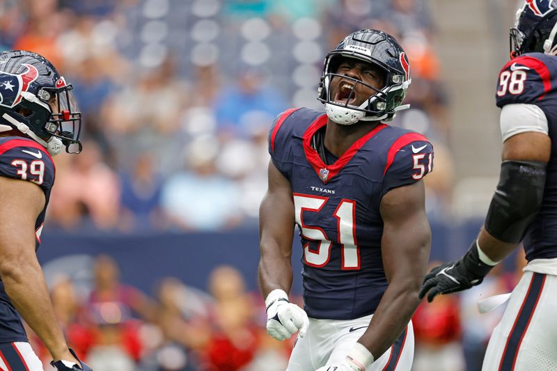 Houston Texans defensive end Will Anderson Jr. (51) reacts after a play during an NFL preseason football game against the Miami Dolphins, Saturday, Aug. 19, 2023, in Houston. (AP Photo/Tyler Kaufman)