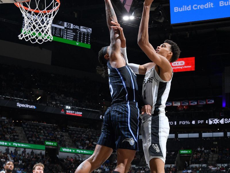 SAN ANTONIO, TX - OCTOBER 9: Victor Wembanyama #1 of the San Antonio Spurs shoots the ball during the game against the Orlando Magic during a NBA preseason game on October 9, 2024 at the Frost Bank Center in San Antonio, Texas. NOTE TO USER: User expressly acknowledges and agrees that, by downloading and or using this photograph, user is consenting to the terms and conditions of the Getty Images License Agreement. Mandatory Copyright Notice: Copyright 2024 NBAE (Photos by Michael Gonzales/NBAE via Getty Images)