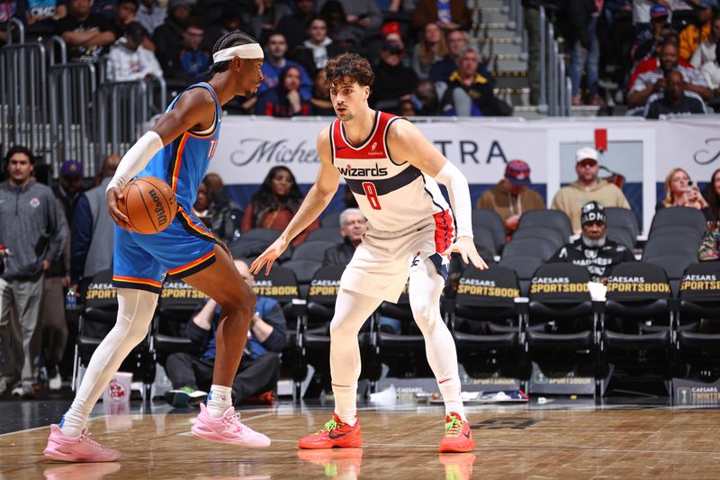 WASHINGTON, DC -? JANUARY 8: Deni Avdija #8 of the Washington Wizards plays defense against Shai Gilgeous-Alexander #2 of the Oklahoma City Thunder during the game on January 8, 2024 at Capital One Arena in Washington, DC. NOTE TO USER: User expressly acknowledges and agrees that, by downloading and or using this Photograph, user is consenting to the terms and conditions of the Getty Images License Agreement. Mandatory Copyright Notice: Copyright 2024 NBAE (Photo by Kenny Giarla/NBAE via Getty Images)