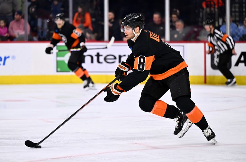 Nov 24, 2023; Philadelphia, Pennsylvania, USA; Philadelphia Flyers defenseman Cam York (8) controls the puck against the New York Rangers in the first period at Wells Fargo Center. Mandatory Credit: Kyle Ross-USA TODAY Sports