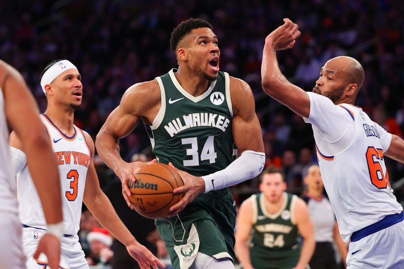 NEW YORK, NEW YORK - DECEMBER 25:  Damian Lillard #0 of the Milwaukee Bucks drives to the basket during the fourth quarter of the game against the New York Knicks at Madison Square Garden on December 25, 2023 in New York City.  NOTE TO USER: User expressly acknowledges and agrees that, by downloading and or using this photograph, User is consenting to the terms and conditions of the Getty Images License Agreement. (Photo by Rich Graessle/Getty Images)