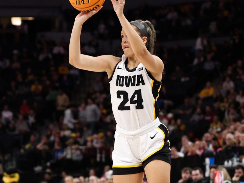 Mar 4, 2023; Minneapolis, MINN, USA; Iowa Hawkeyes guard Gabbie Marshall (24) shoots against the Maryland Terrapins during the first half at Target Center. Mandatory Credit: Matt Krohn-USA TODAY Sports