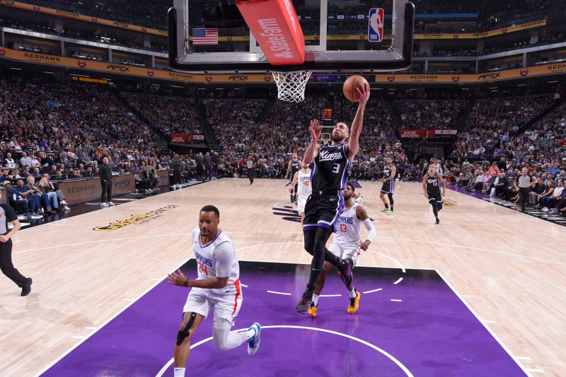 SACRAMENTO, CA - APRIL 2:  Chris Duarte #3 of the Sacramento Kings goes to the basket during the game on April 2, 2024 at Golden 1 Center in Sacramento, California. NOTE TO USER: User expressly acknowledges and agrees that, by downloading and or using this Photograph, user is consenting to the terms and conditions of the Getty Images License Agreement. Mandatory Copyright Notice: Copyright 2024 NBAE (Photo by Rocky Widner/NBAE via Getty Images)