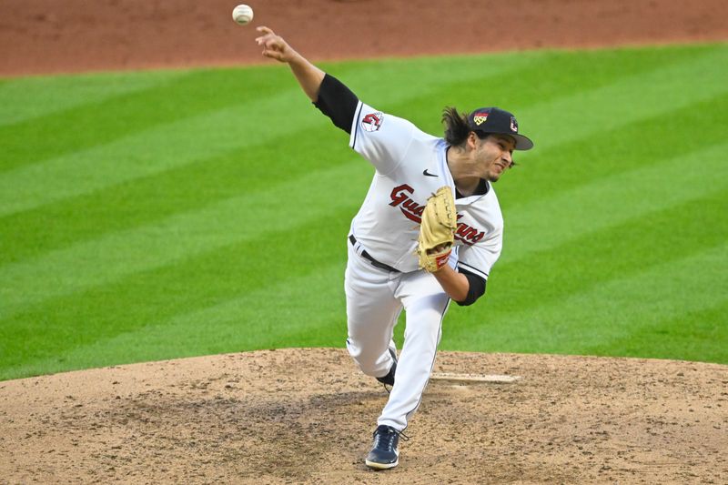 Jul 4, 2023; Cleveland, Ohio, USA; Cleveland Guardians relief pitcher Eli Morgan (49) delivers a pitch in the fifth inning against the Atlanta Braves at Progressive Field. Mandatory Credit: David Richard-USA TODAY Sports