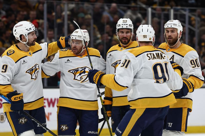 Jan 27, 2026; Boston, Massachusetts, USA; Nashville Predators defenseman Roman Josi (59) is surrounded by teammates (left to right) left wing Filip Forsberg (9), center Jonathan Marchessault (81), center Steven Stamkos (91) and center Ryan O'Reilly (90) after scoring on the power play against the Boston Bruins during the second period at TD Garden. Mandatory Credit: Winslow Townson-Imagn Images