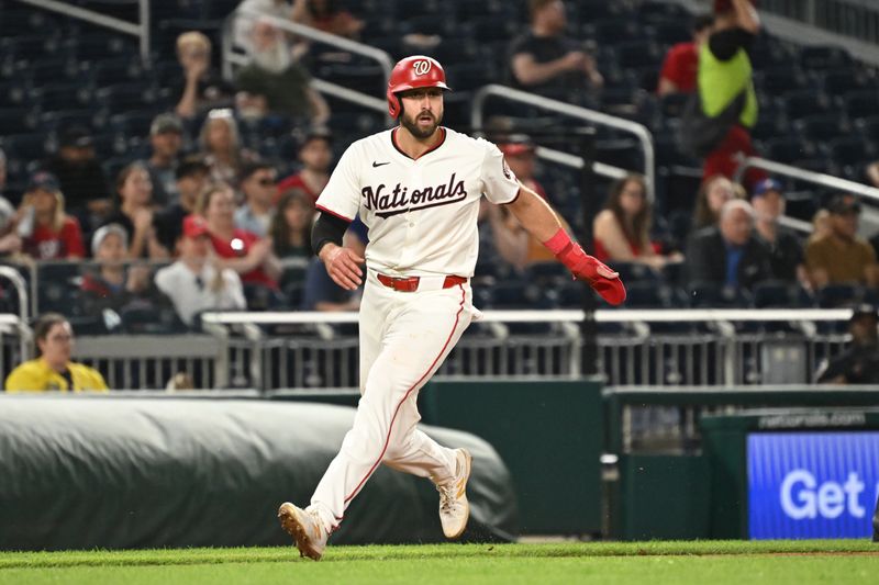 May 20, 2024; Washington, District of Columbia, USA; Washington Nationals first base Joey Gallo (24) stops a third base against the Minnesota Twins during the eighth inning at Nationals Park. Mandatory Credit: Rafael Suanes-USA TODAY Sports