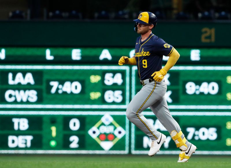 Sep 25, 2024; Pittsburgh, Pennsylvania, USA;  Milwaukee Brewers designated hitter Jake Bauers (9) circles the bases on a solo home run against the Pittsburgh Pirates during the second inning at PNC Park. Mandatory Credit: Charles LeClaire-Imagn Images