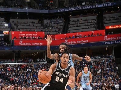 MEMPHIS, TN - JANUARY 2:  Devin Vassell #24 of the San Antonio Spurs goes to the basket during the game on January 2, 2024 at FedExForum in Memphis, Tennessee. NOTE TO USER: User expressly acknowledges and agrees that, by downloading and or using this photograph, User is consenting to the terms and conditions of the Getty Images License Agreement. Mandatory Copyright Notice: Copyright 2024 NBAE (Photo by Joe Murphy/NBAE via Getty Images)