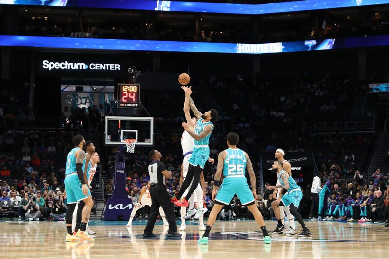 CHARLOTTE, NC - JANUARY 29:  Nick Richards #4 of the Charlotte Hornets goes for the tip-off against the New York Knicks on January 29, 2024 at Spectrum Center in Charlotte, North Carolina. NOTE TO USER: User expressly acknowledges and agrees that, by downloading and or using this photograph, User is consenting to the terms and conditions of the Getty Images License Agreement.  Mandatory Copyright Notice:  Copyright 2024 NBAE (Photo by Brock Williams-Smith/NBAE via Getty Images)