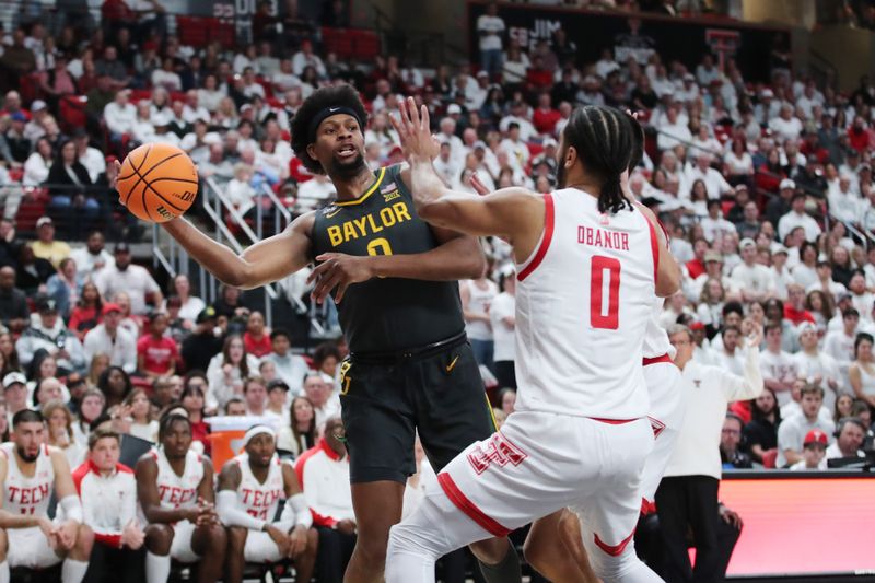 Jan 17, 2023; Lubbock, Texas, USA;  Baylor Bears forward Flo Thumb (0) passes the ball in front of the Texas Tech Red Raiders forward Kevin Obanor (0) in the first half at United Supermarkets Arena. Mandatory Credit: Michael C. Johnson-USA TODAY Sports