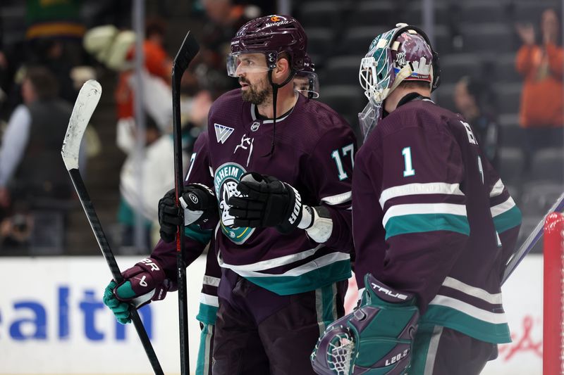 Mar 6, 2024; Anaheim, California, USA;  Anaheim Ducks left wing Alex Killorn (17) celebrates a victory with goaltender Lukas Dostal (1) after defeating the Ottawa Senators 2-1 at Honda Center. Mandatory Credit: Kiyoshi Mio-USA TODAY Sports